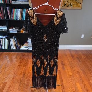 Elegant Black and Gold Sequin Midi Dress